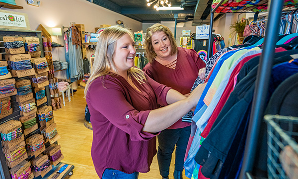 two women shopping in a boutique