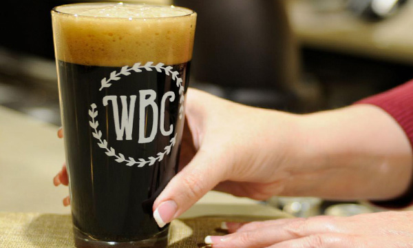 hand holding WBC beer