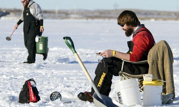 man ice fishing